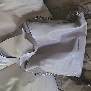 More Photos of the Mk purse grey with chains on each side for added room